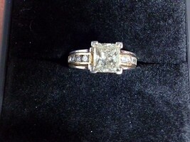  14K Yellow Gold Ring with Platinum setting w/larger princess cut diamond